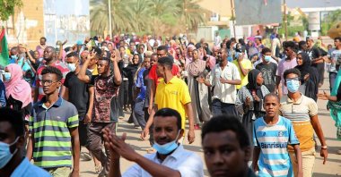 Thousands of pro-democracy protesters take to the streets to condemn a takeover by military officials in Khartoum, Sudan, Oct. 25, 2021. (AP Photo)