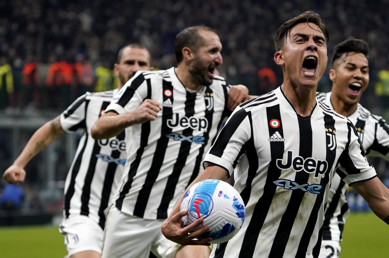 Juventus' Paulo Dybala (2nd R) and teammates celebrate a goal against Inter Milan in a Serie A match, Milan, Italy, Oct. 24, 2021. (AA Photo)