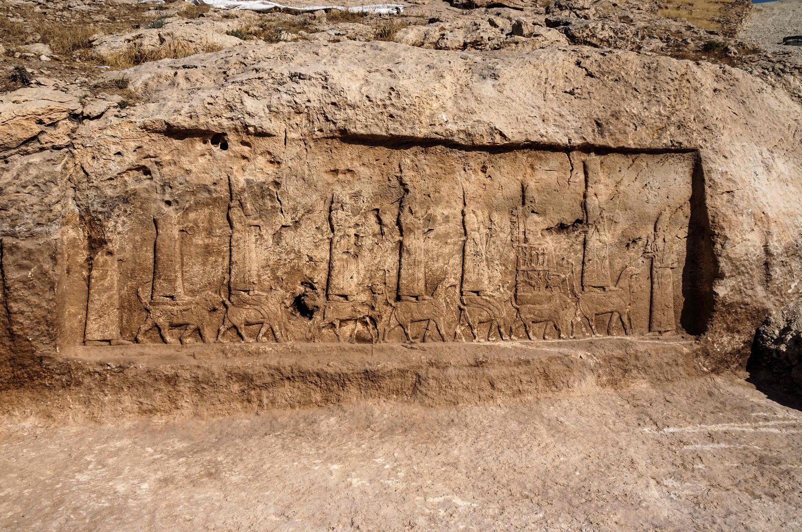 An undated handout picture provided by Terra Di Ninive on October 24, 2021, shows a view of carvings discovered on the walls of an ancient irrigation canal by a team of Kurdish and Italian archaeologists near Faydeh in the Nineveh area of northern Iraq. (AFP Photo)