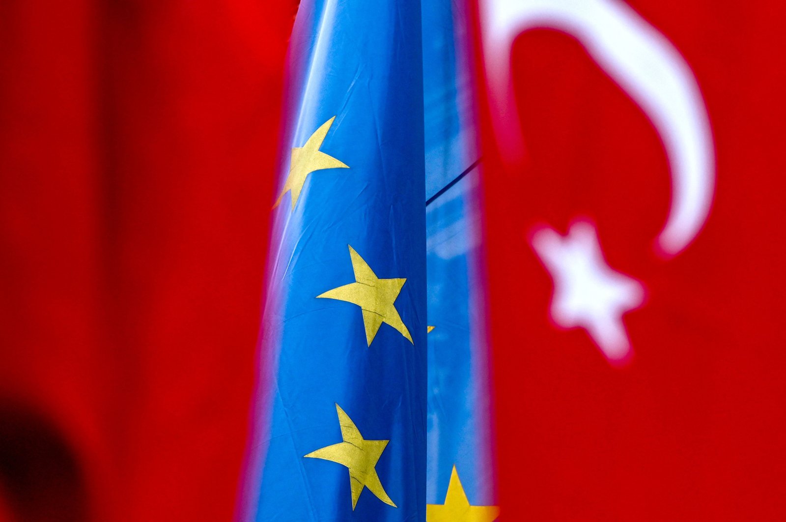 A European flag and a Turkish national flag fly near Taksim Square in Istanbul, Turkey, Oct. 25, 2021 (AFP Photo)