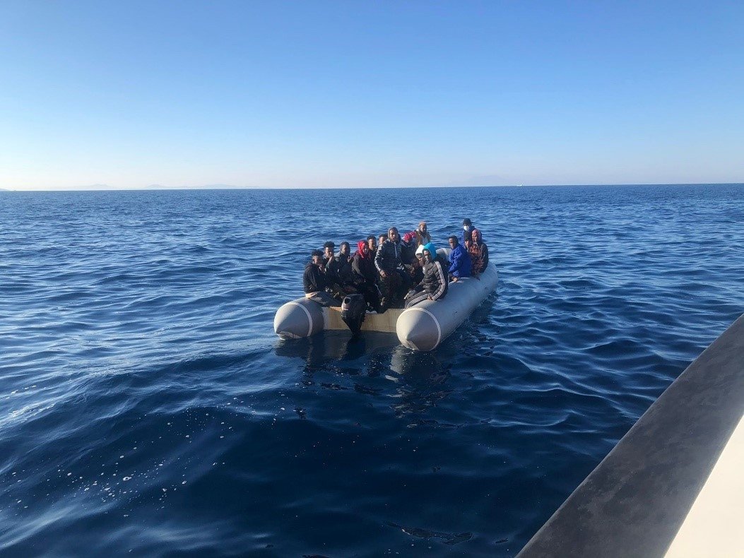 A group of irregular migrants on a rubber boat is rescued off the coast of in the Aegean province of Aydın, southwestern Turkey, Sept. 29, 2021. (AA Photo)