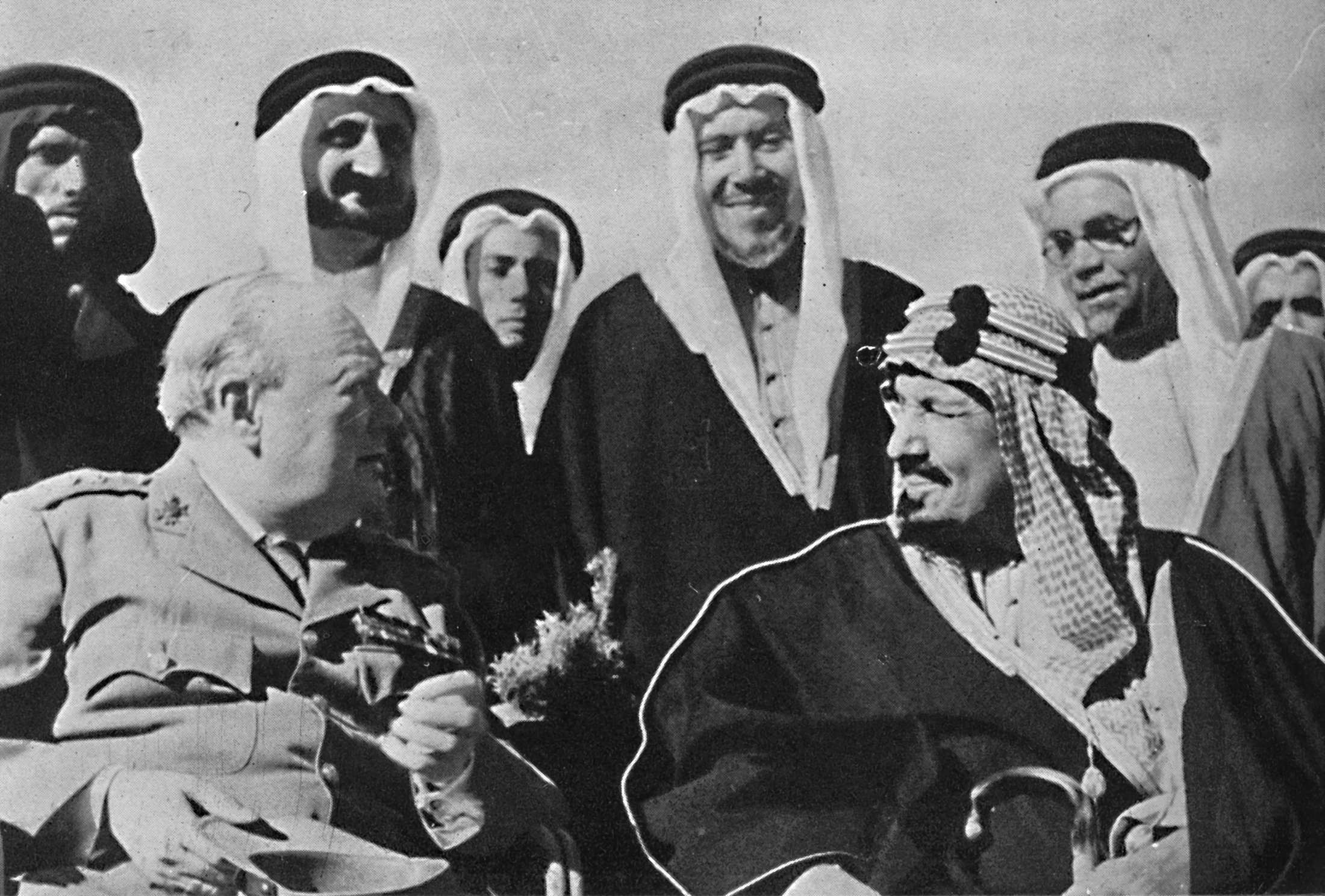 Winston Churchill (foreground L) talks with Middle Eastern rulers, including King Abdulaziz bin Abdul Rahman Al Saud (foreground R) of Saudi Arabia, in the Grand Hotel du Lac, south of Cairo, Egypt, February 1945. (Getty Images)