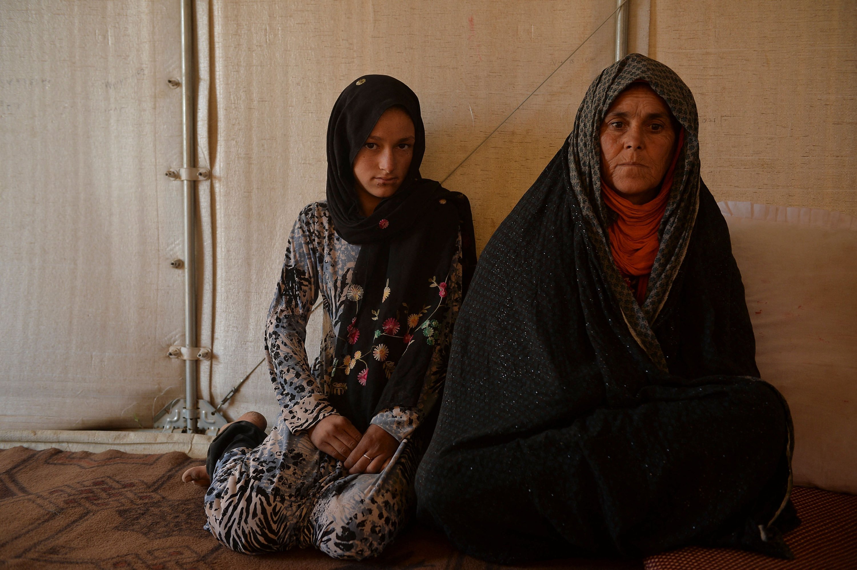 Habibeh (L), a girl who lives with her mother Rabia (R) but should have gone to join her future spouse
