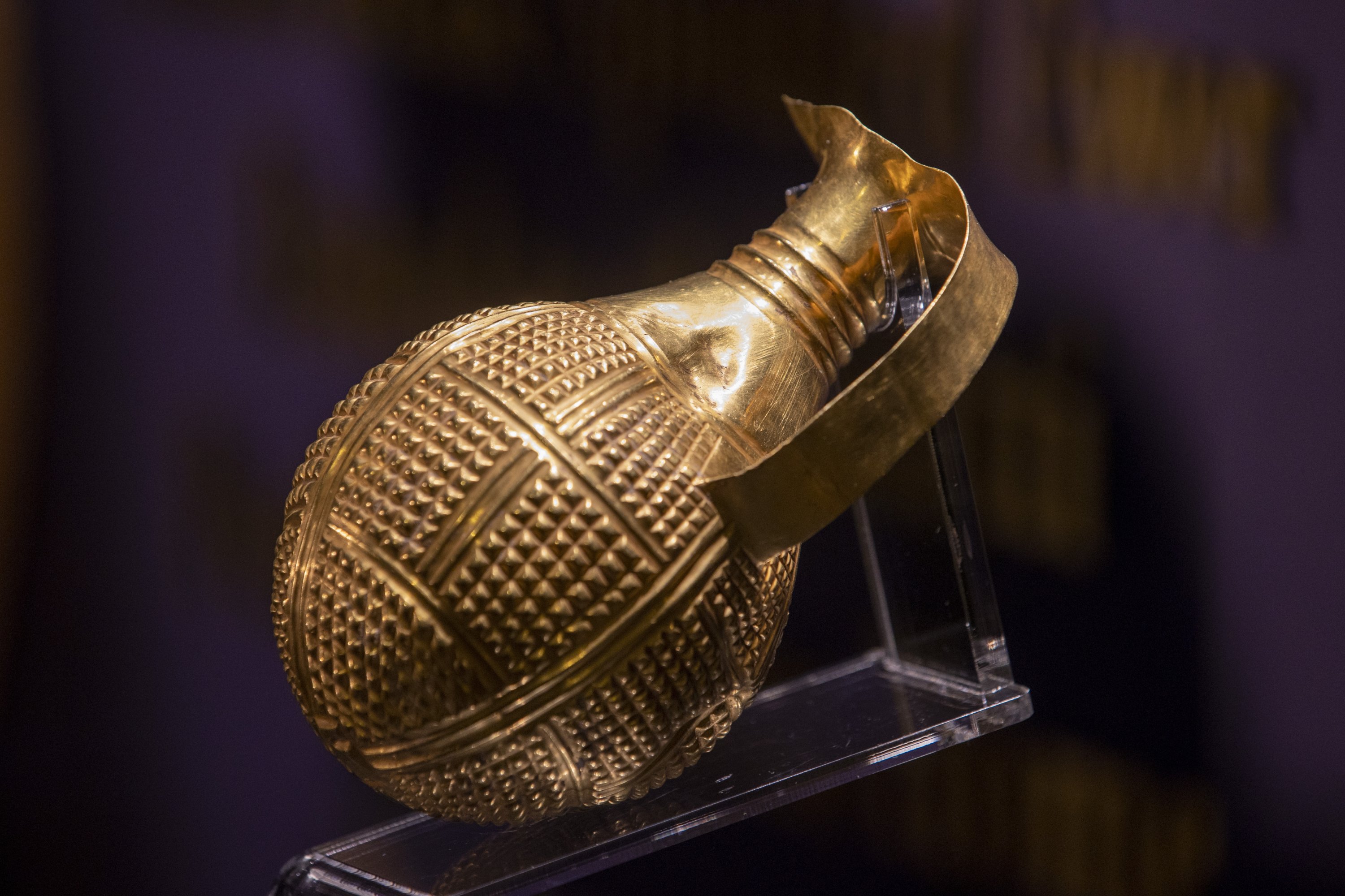 A photo showing the golden beak-spouted ewer on display in the Museum of Anatolian Civilization. (Photo by Anadolu Agency)