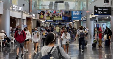 Passengers and others walk at Miami International Airport (MIA) in Miami, Florida, U.S., Aug. 1, 2021. (AFP Photo)