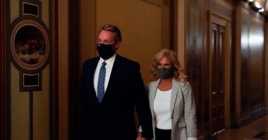 Former Senator Jeff Flake (R-AZ) walks through the U.S. Capitol in Washington, U.S., Oct. 19, 2021. (Reuters)