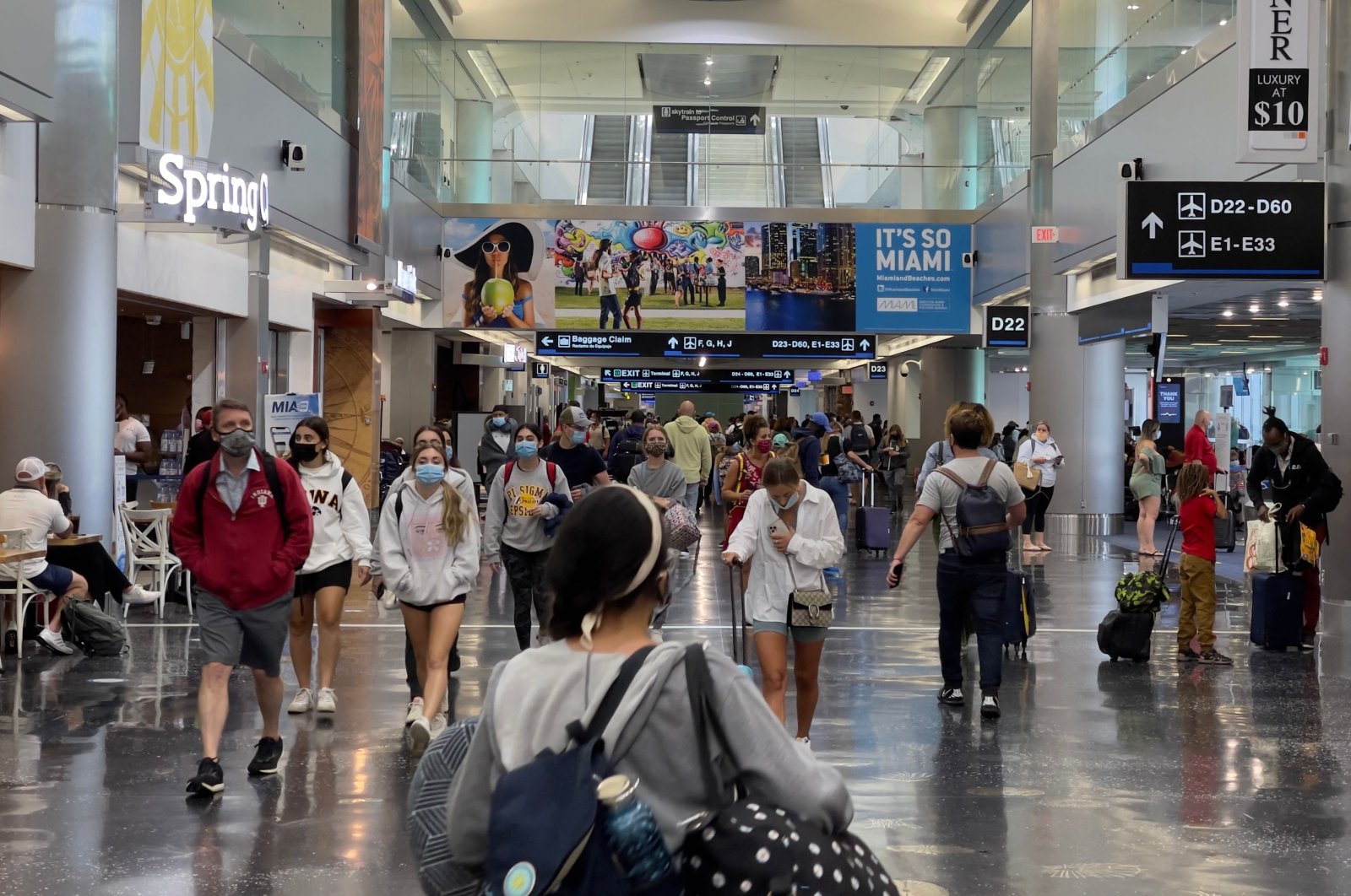 Passengers and others walk at Miami International Airport (MIA) in Miami, Florida, U.S., Aug. 1, 2021. (AFP Photo)