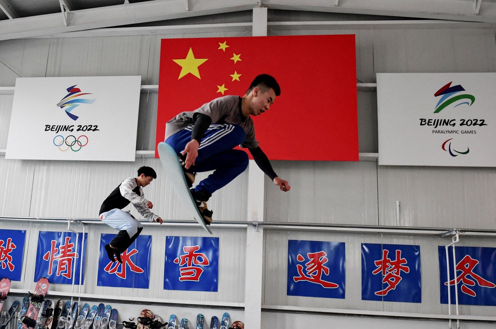 Students train at a Youth Winter Olympic Sports School in Zhangjiakou, northern China, March 18, 2021. (AFP Photo) 