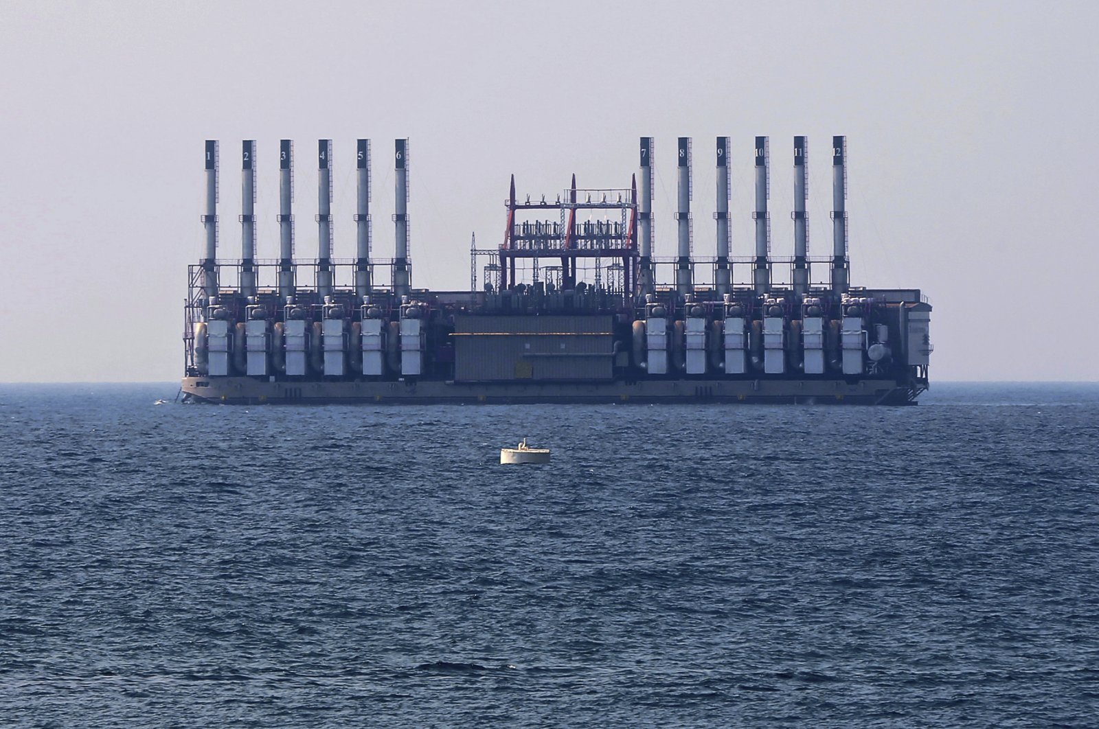 A floating power station of Karpowership waits off the coast at Jiyeh, south of Beirut, Lebanon, July 16, 2018. (AP Photo)