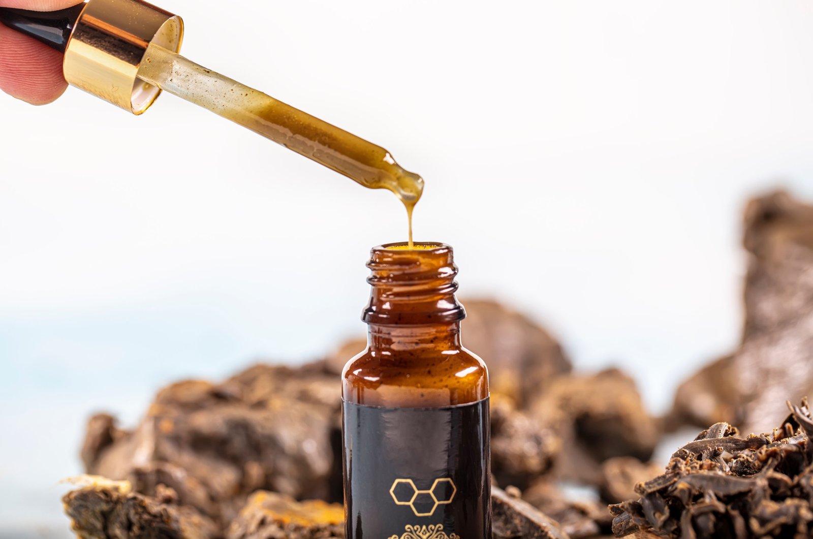 A photo showing propolis, also known as bee glue or bee gum. (Shutterstock Photo)