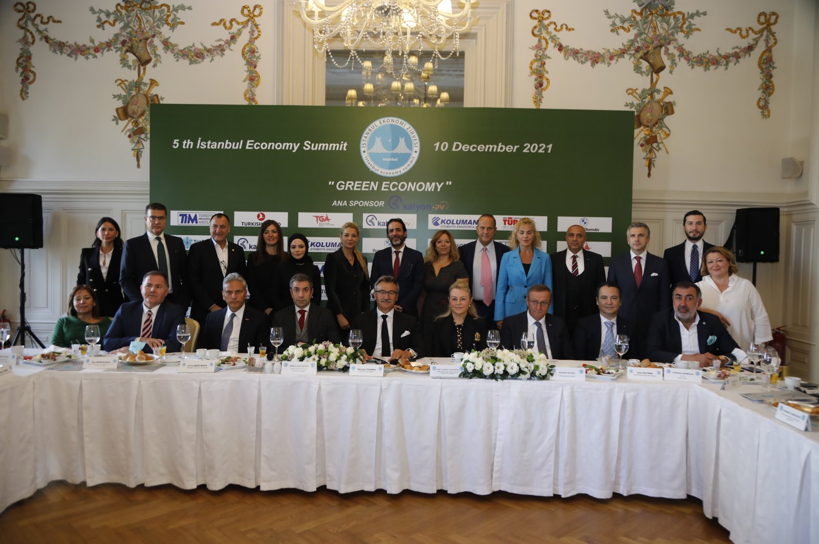 Istanbul Economy Summit Chairperson of the Board Kürşad Tüzmen and other executives pose for a photo during a press meeting in Istanbul, Turkey, Oct. 26, 2021. (Courtesy of Istanbul Economy Summit)