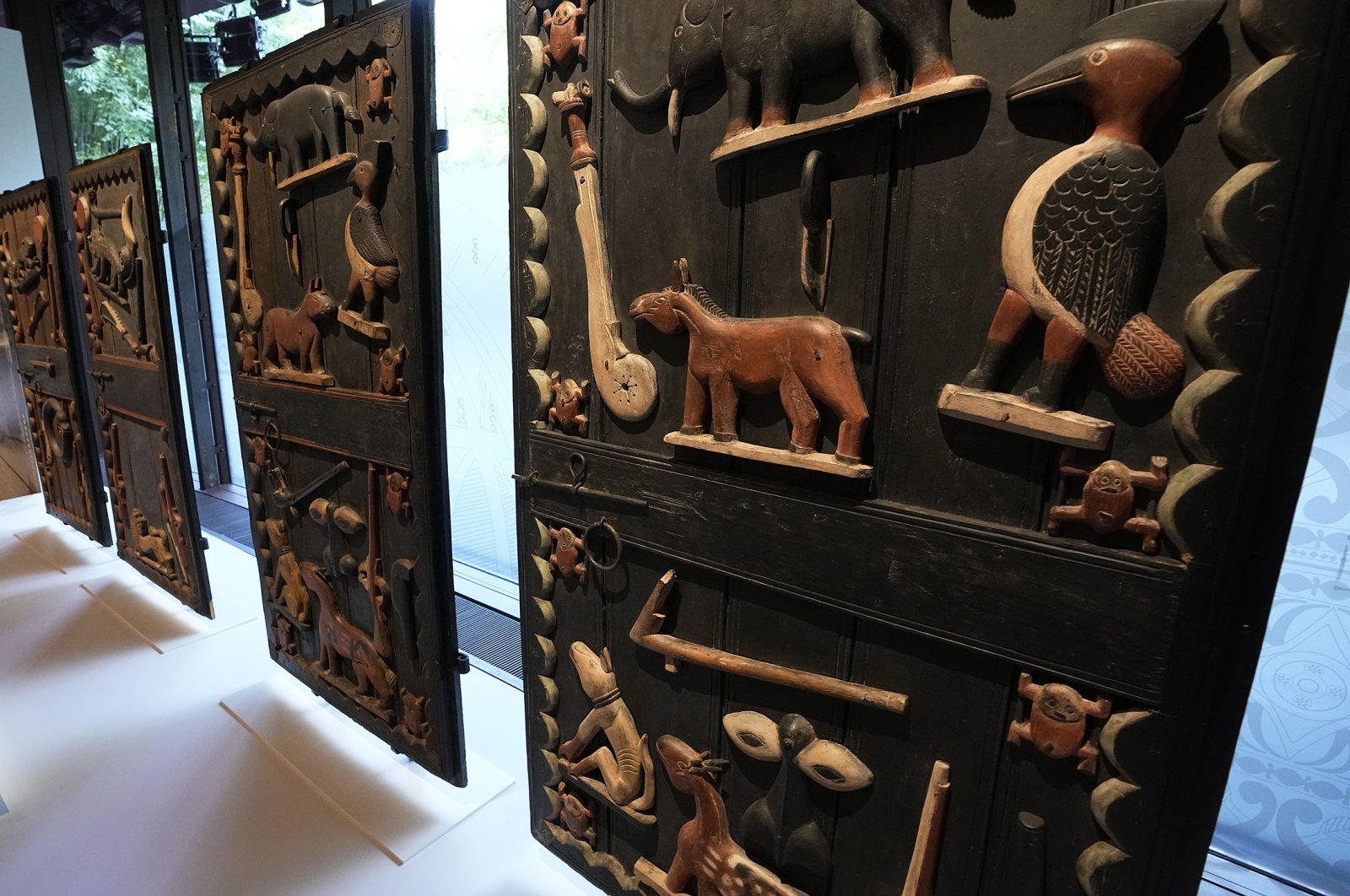The doors of King Glele's palace, from Benin 19th century, pictured at the Quai Branly – Jacques Chirac museum, in Paris, France, Oct. 25, 2021. (AP Photo)