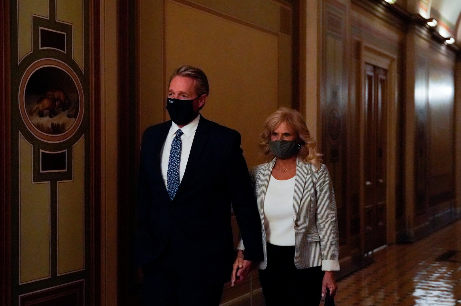 Former Senator Jeff Flake (R-AZ) walks through the U.S. Capitol in Washington, U.S., Oct. 19, 2021. (Reuters)