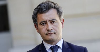 French Interior Minister Gerald Darmanin looks on as the prime minister speaks to the press after a videoconference meeting on emergency measures regarding local authorities' finances at the Hotel Matignon, in Paris, France, May 29, 2020. (AFP Photo)