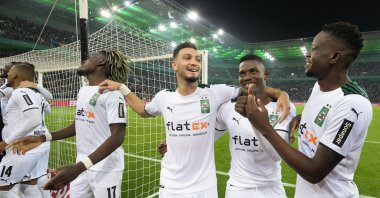Monchengladbach players celebrate after the German Cup match against Borussia Monchengladbach at the Borussia Park, in Monchengladbach, Germany, Oct. 27, 2021. (AP Photo)