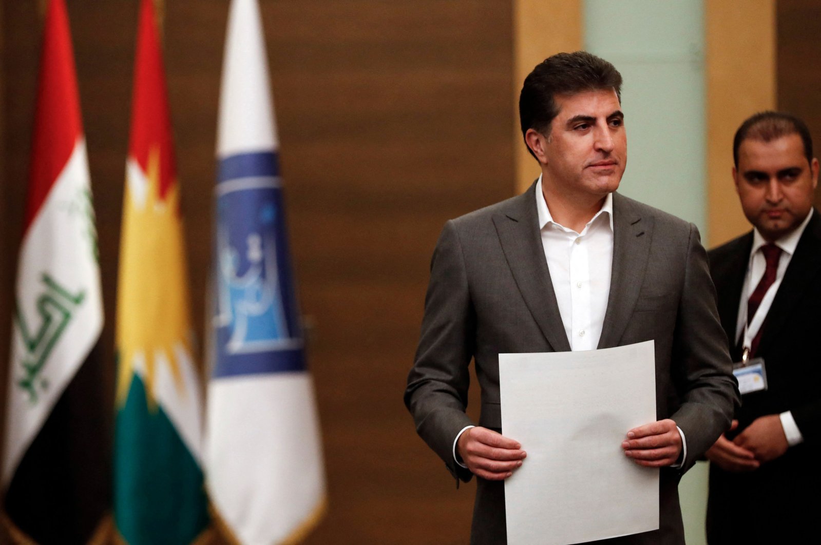 President of Iraq's Kurdistan Regional Government (KRG) Nechirvan Barzani prepares to vote in the parliamentary election at a polling station in Irbil, Iraq, Oct. 10, 2021. (AFP Photo)