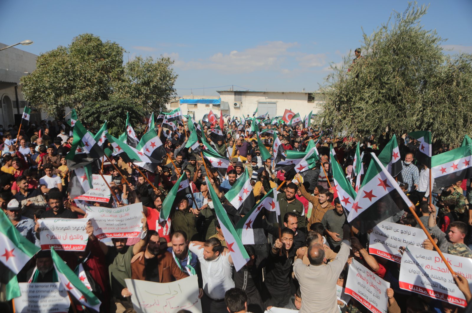 People who had to flee Tal Rifaat protest YPG terror group's oppression, Azaz, northern Syria, Oct. 22, 2021. (AA Photo)