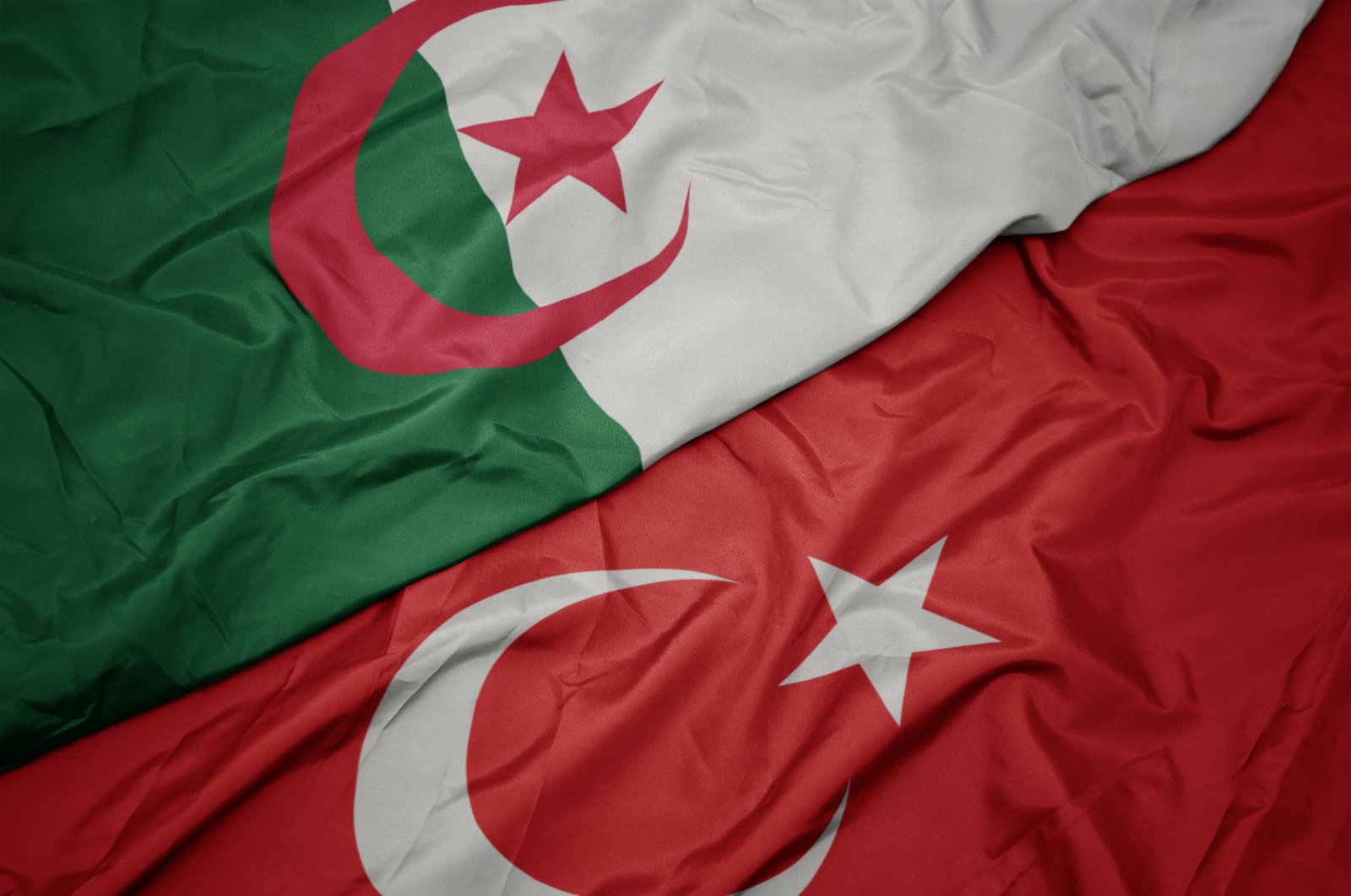 The flags of Turkey and Algeria. (Photo by Shutterstock)