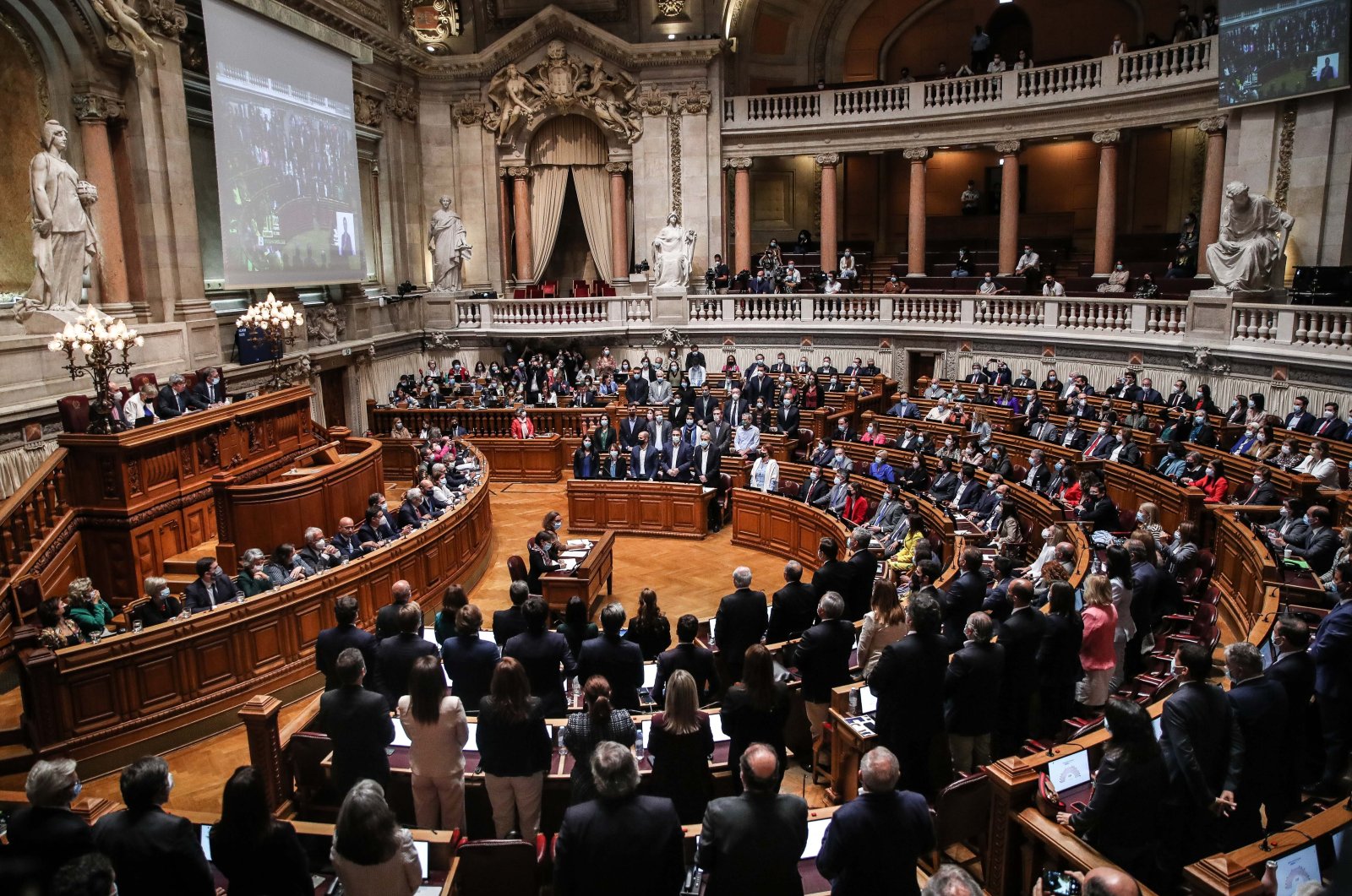 The parliamentary benches of the Left Bloc (BE), PCP, PEV, PSD, CDS-PP, Liberal Initiative and Chega vote against the proposed State Budget for 2022, in the Portuguese Parliament, Lisbon, Portugal, Oct. 27, 2021. (EPA Photo)