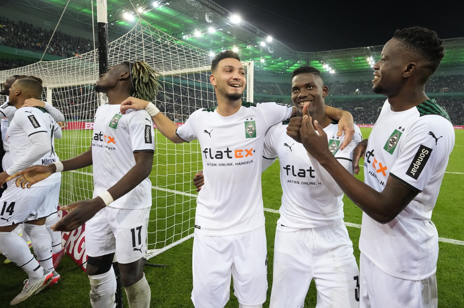 Monchengladbach players celebrate after the German Cup match against Borussia Monchengladbach at the Borussia Park, in Monchengladbach, Germany, Oct. 27, 2021. (AP Photo)