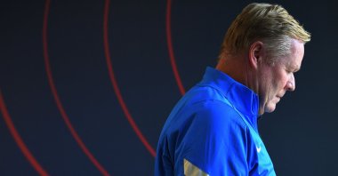 Barcelona coach Ronald Koeman leaves a press conference, Barcelona, Spain, Oct. 23, 2021.