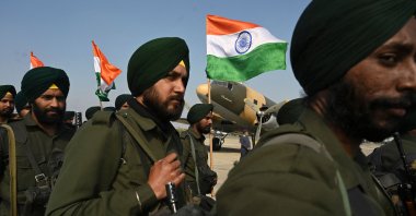 Indian army soldiers perform during a re-enactment of the 1947 landings of Indian troops at Srinagar, during a function at the Indian Air-Force base in Srinagar on Oct. 27, 2021. (AFP Photo)