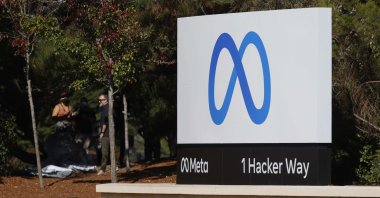 A sign with a new logo and the name "Meta" is displayed in front of Facebook headquarters in Menlo Park, California, U.S., Oct. 28, 2021. (AFP Photo)