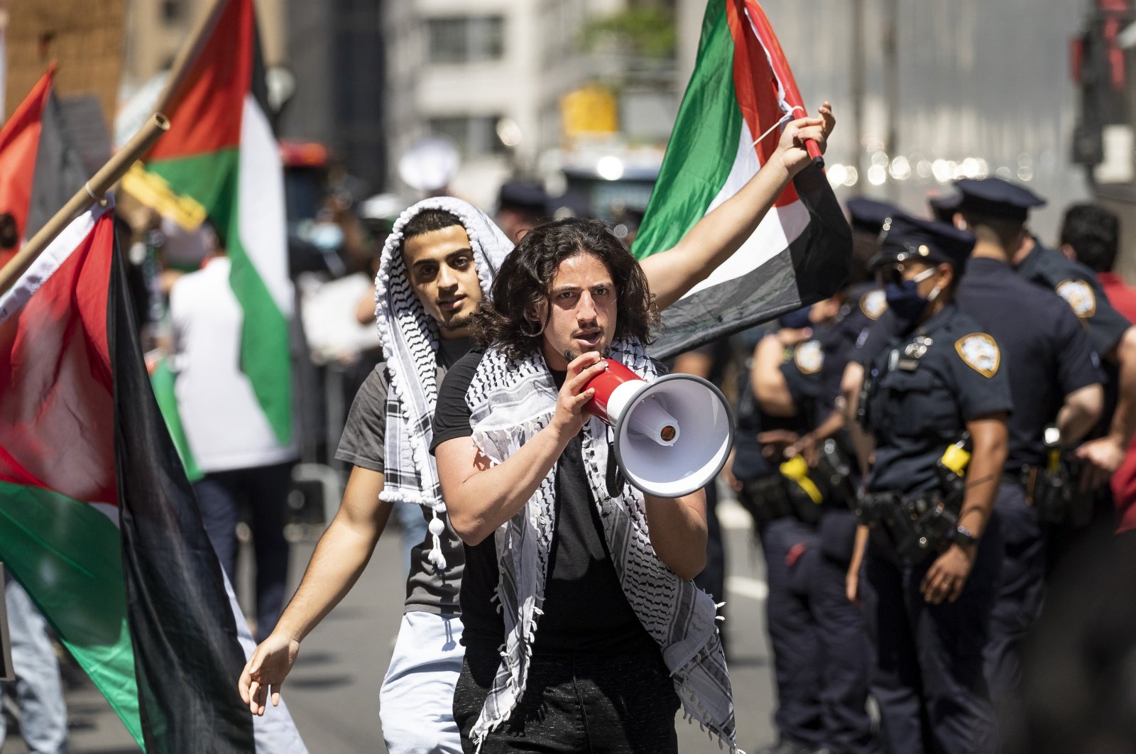 People attend a rally and march in support of Palestine near the Israeli consulate in New York City, U.S., May 18, 2021. (EPA-EFE Photo)