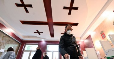 A man casts his ballot at a polling station in Tbilisi, Georgia, Oct. 30, 2021. (AFP Photo)
