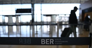 A passenger is pictured at Terminal 1 of Berlin Brandenburg "Willy Brandt" airport in Brandenburg, near Schonefeld and Berlin, Germany, Feb. 20, 2021. (AFP File Photo)