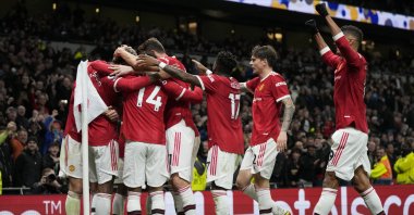 Manchester United's Marcus Rashford (L) celebrates after scoring his side's third goal during the English Premier League soccer match between Tottenham Hotspur and Manchester United at the Tottenham Hotspur Stadium in London, U.K., Saturday, Oct. 30, 2021. (AP Photo)
