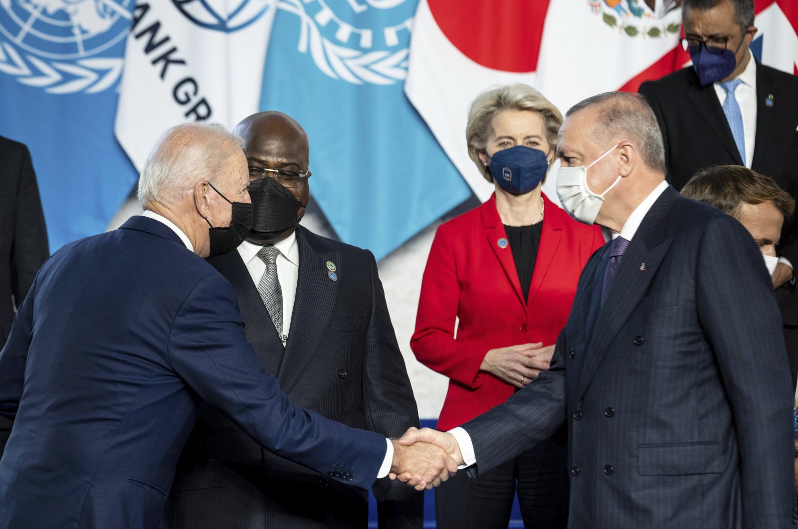 President Recep Tayyip Erdoğan (R) and U.S. President Joe Biden shake hands ahead of the opening session of the G-20 summit at La Nuvola conference center, in Rome, Italy, Oct. 30, 2021. (AP Photo)