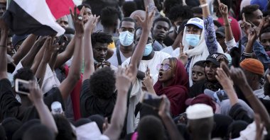 People chant slogans during a protest in Khartoum, Sudan, Saturday, Oct. 30, 2021. (AP Photo)