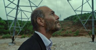 A still shot from "Bağlılık Hasan" shows Umut Karadağ in the role of Hasan. 