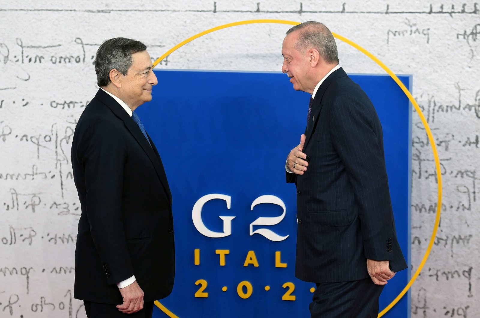 Italian Prime Minister Mario Draghi (L) welcomes President Recep Tayyip Erdoğan as he arrives for the G-20 Leaders' Summit at La Nuvola Congress Centre in Rome, Italy, Oct. 30, 2021. (EPA Photo)
