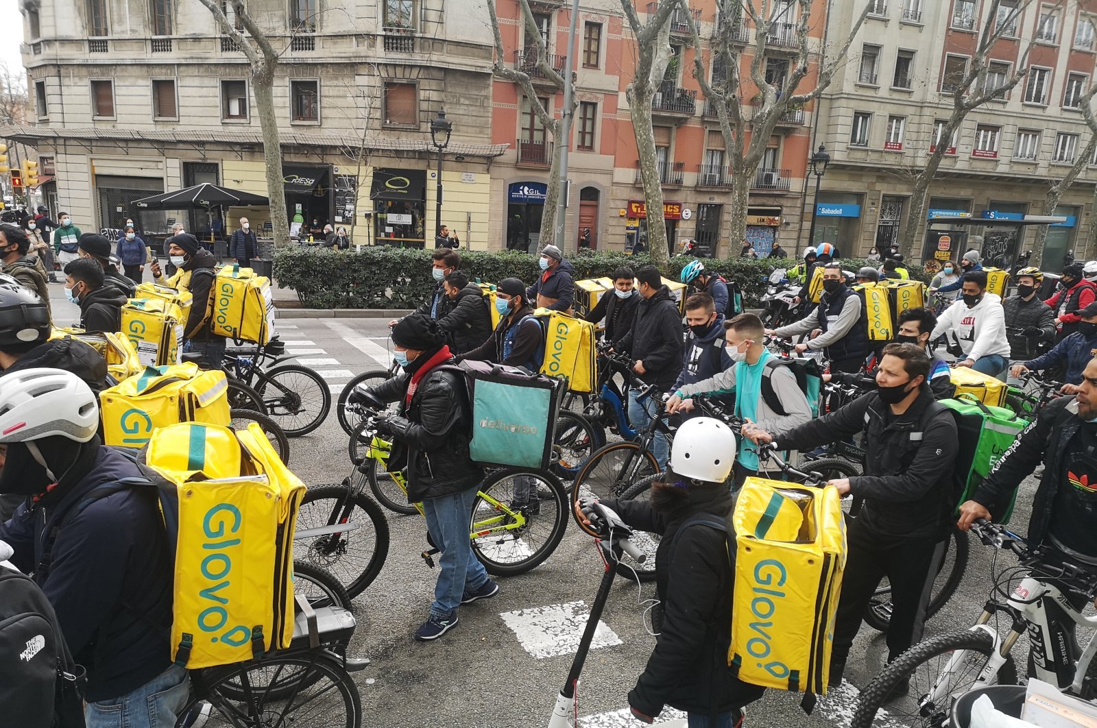 Riders of different food delivery platforms demonstrate against bad salary and tax system, Barcelona, Spain, March, 3 2021. (Shutterstock Photo)