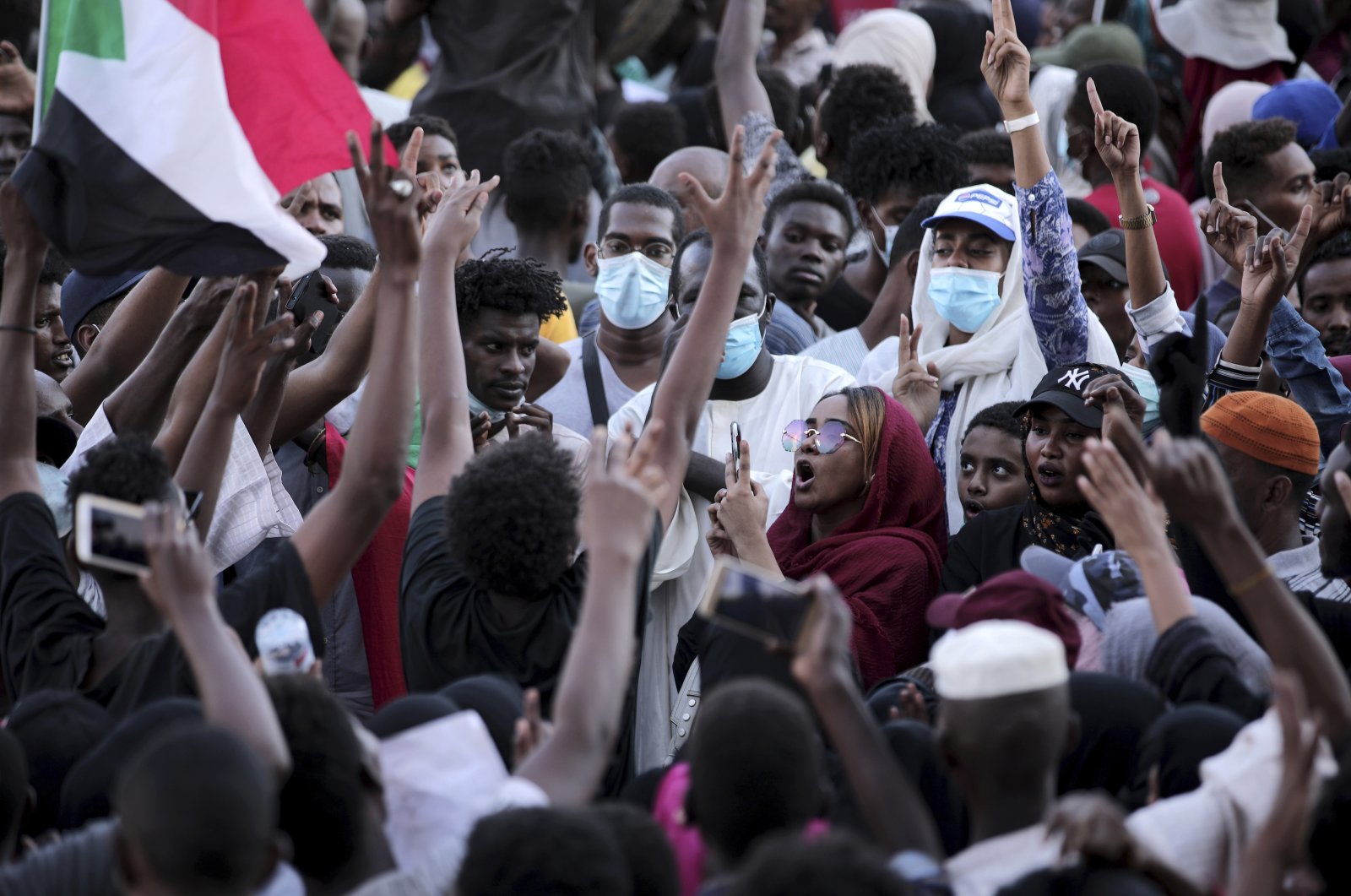 People chant slogans during a protest in Khartoum, Sudan, Saturday, Oct. 30, 2021. (AP Photo)