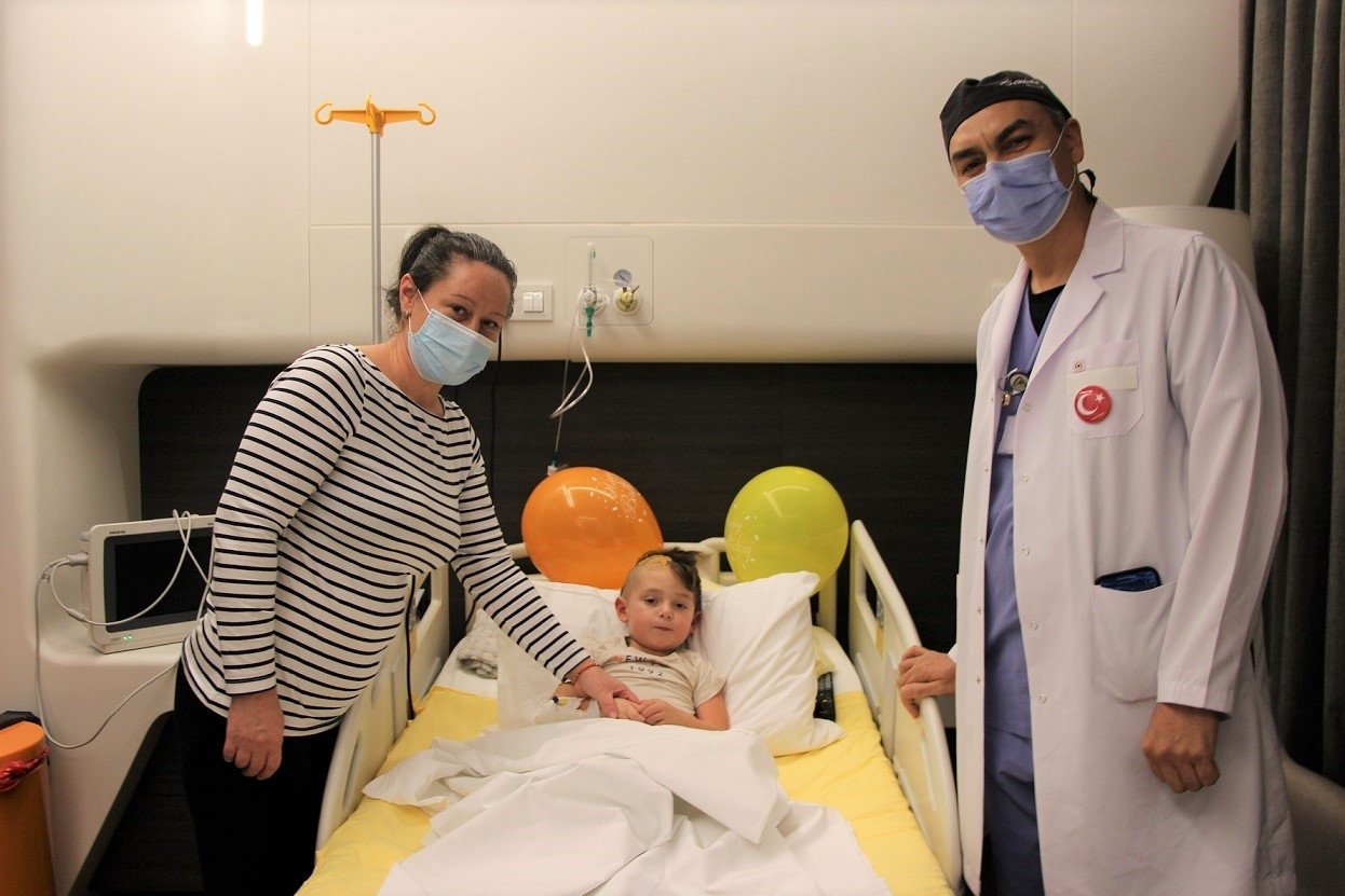 Eduard Costan, a 4-year-old from Romania, in bed after undergoing surgery in Turkey. (Photo by DHA)