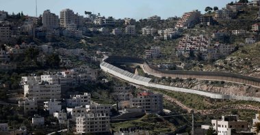 This picture taken from Jerusalem shows the protected road through the West Bank town of Bethlehem leading to the Israeli Gush Etzion settlement block and the West Bank city of Hebron, occupied Palestine, Feb. 12, 2016. (AFP Photo)