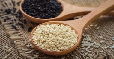 White and black sesame seeds. (Shutterstock Photo)