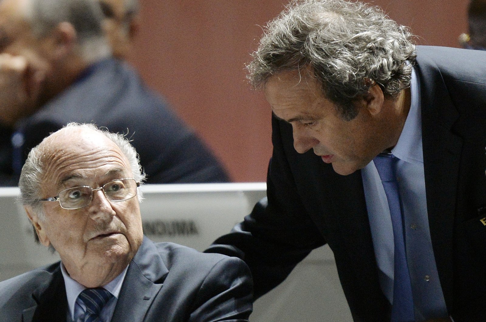 FIFA President Sepp Blatter, (L), and UEFA President Michel Platini engaged in conversation during the 65th FIFA Congress held at the Hallenstadion in Zurich, Switzerland, on Friday, May 29, 2015. (AP File Photo)