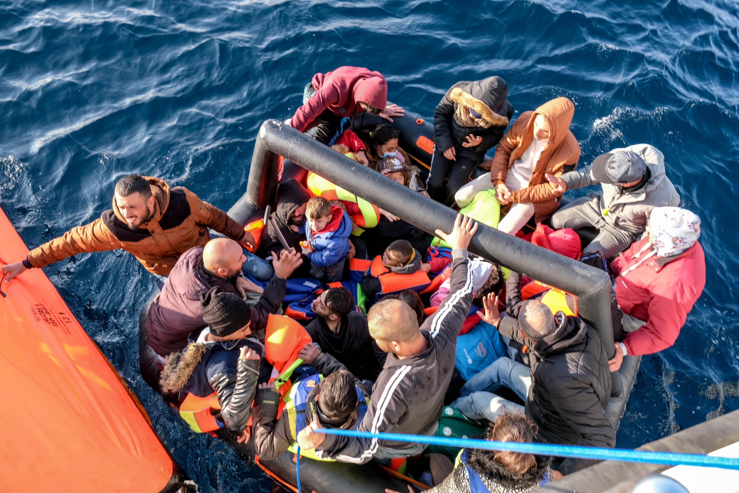 Migrants are rescued by Turkish coast guard units in the Aegean Sea, Turkey, Nov. 3, 2021. (Photo by Uğur Yıldırım)