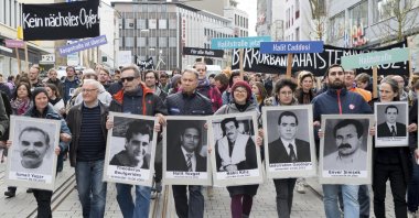 Participants of the demonstration "Kein Naechstes Opfer!" ("No other victim!") walk through the inner city of Kassel, Germany, April 6, 2017. (AP Photo)