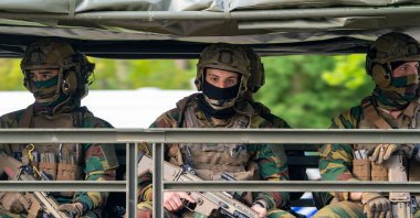 Paratroopers of the Belgian army sit on a Unimog. A suspected right-wing extremist professional soldier is still on the run in Belgium, May 21, 2021. (Getty Image)