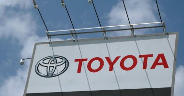 The logo of Japan's Toyota Motor at a company dealership in Tokyo, Japan, Aug. 6, 2020. The world's top-selling carmaker Toyota has come joint last in a Greenpeace ranking of carbon emission efforts by auto firms, according to a list published on Nov. 4, 2021, during the COP26 climate summit. (AFP Photo)