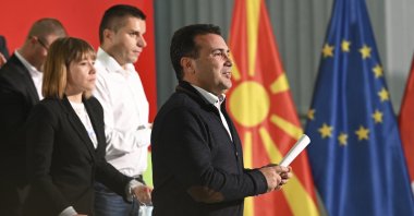 North Macedonia's Prime Minister Zoran Zaev, center, walks following a news conference at the party headquarters in Skopje, North Macedonia, Oct. 31, 2021. (AP Photo)