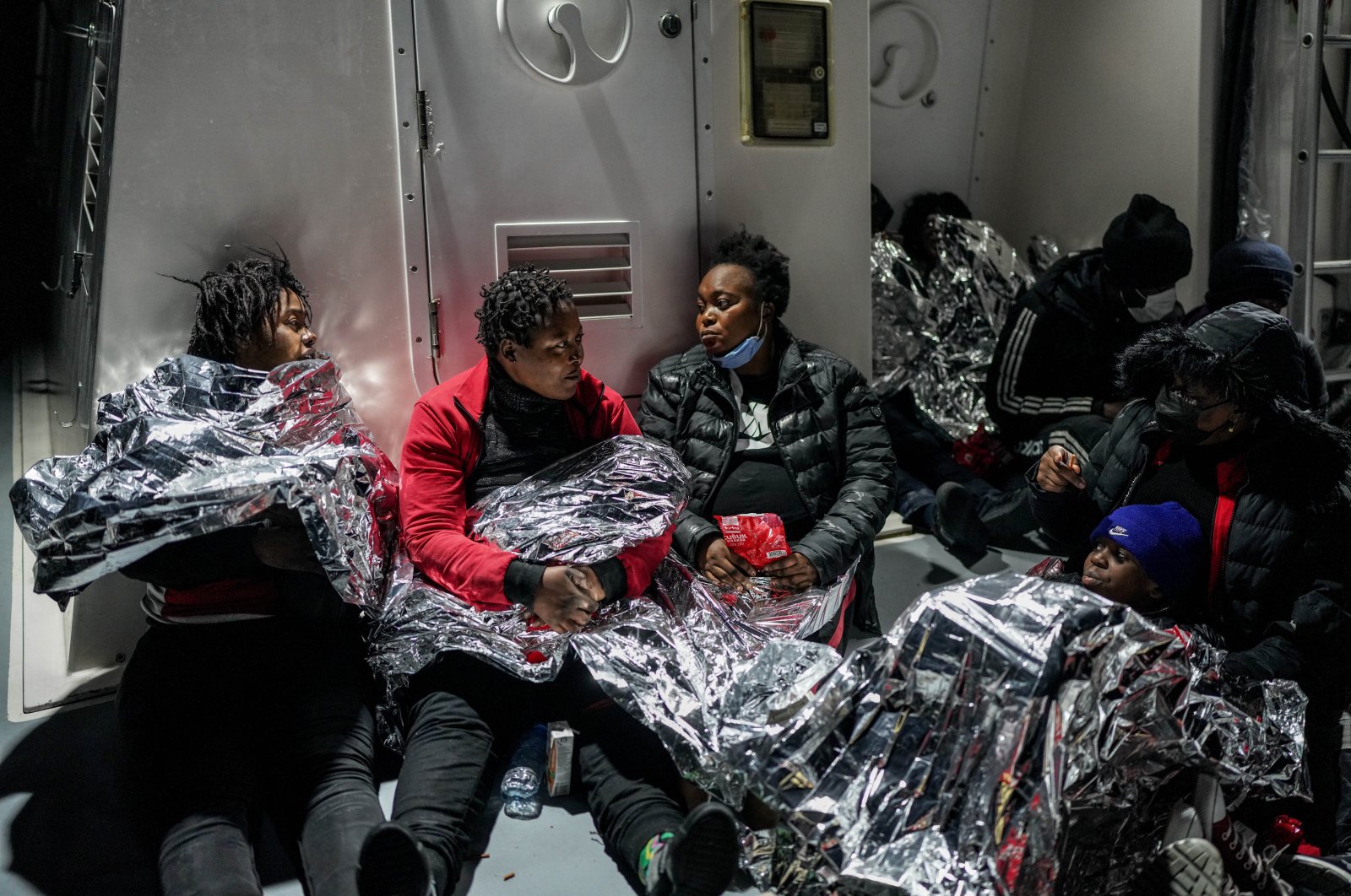 Migrants rescued by Turkish coast guard units in the Aegean Sea, Turkey, Nov. 3, 2021. (Photo by Uğur Yıldırım)