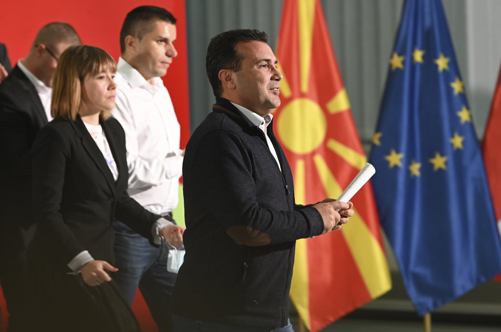 North Macedonia's Prime Minister Zoran Zaev, center, walks following a news conference at the party headquarters in Skopje, North Macedonia, Oct. 31, 2021. (AP Photo)
