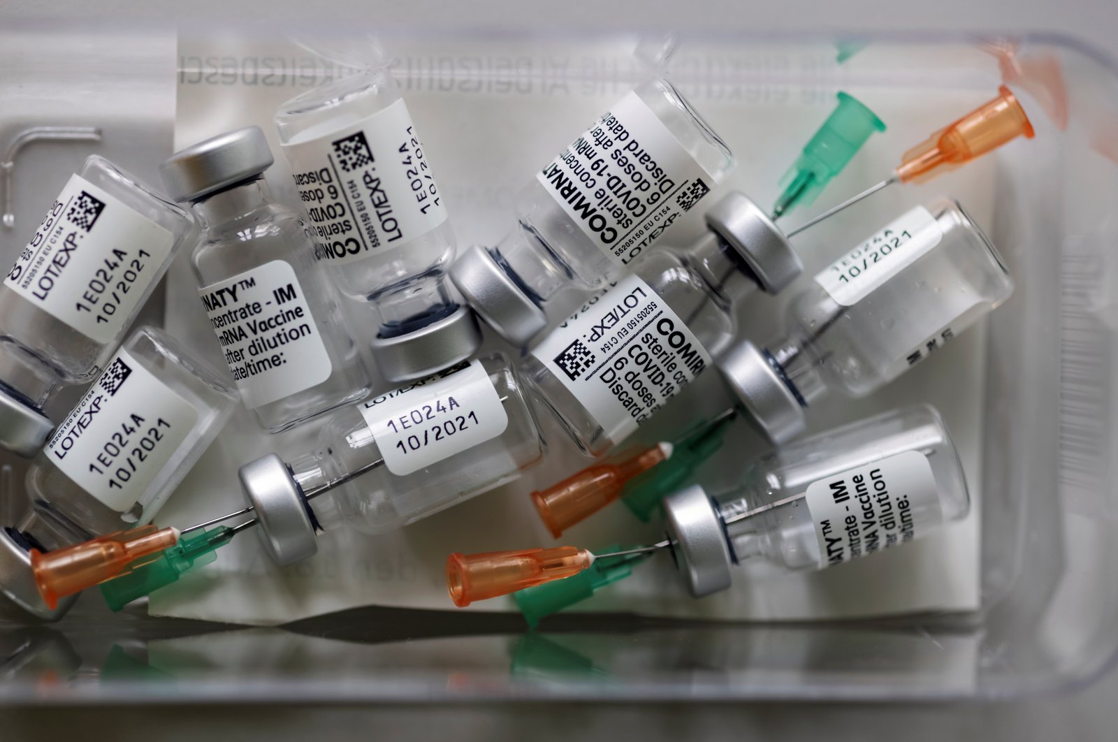 Empty vials of the "Comirnaty" Pfizer-BioNTech coronavirus vaccine are pictured in a doctor's office in Berlin, Germany, Nov. 2, 2021. (Reuters Photo)