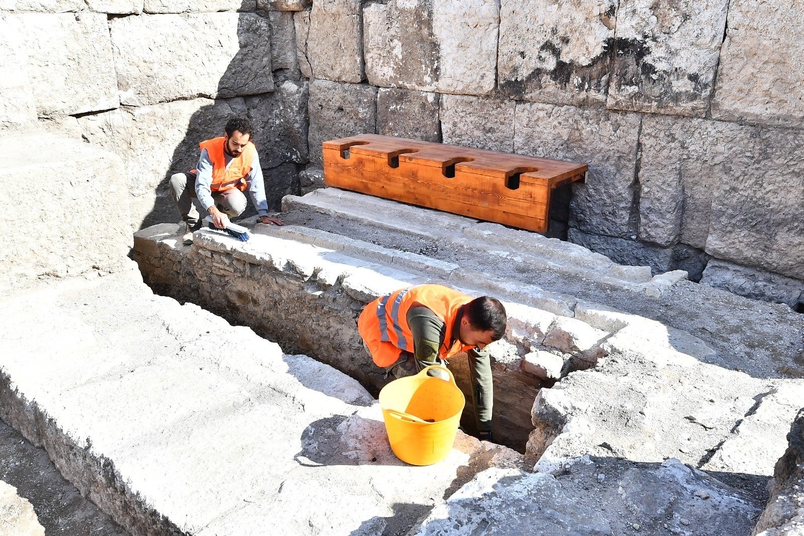 Archaeologists work in the area of the latrina in ancient city of Smyrna, Izmir, western Turkey, Nov. 3, 2021. (AA Photo)